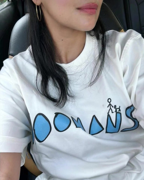 Megha Gupta in the Hoomans logo tee