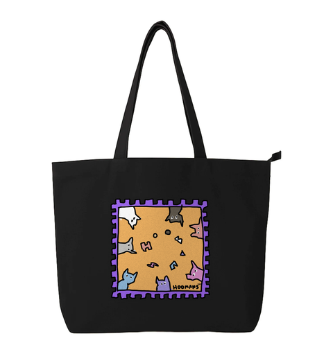 Hoomans Stamp black cotton tote bag printed with an illustrated postage stamp of cats peeking in from every edge