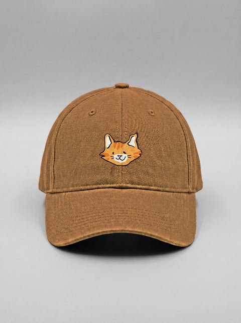 Khaki baseball cap with embroidered orange tabby cat face, front view