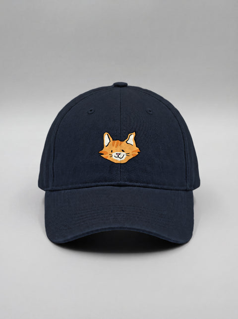 Navy blue baseball cap with embroidered orange tabby cat face, front view