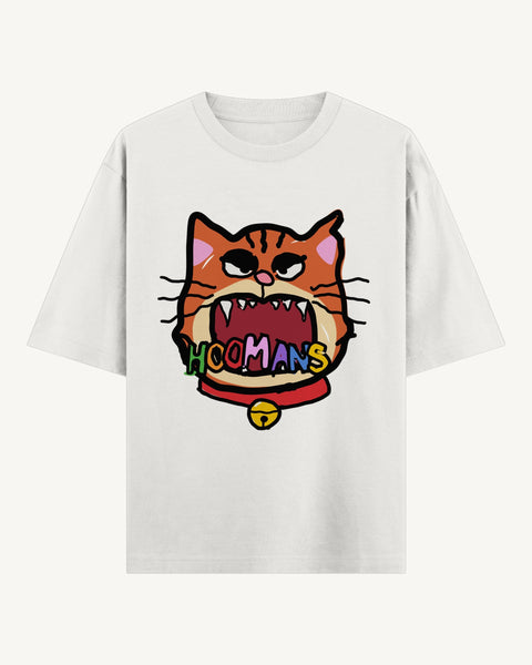 White oversized tee with a roaring orange tabby cat head, multicolour hoomans letters clenched in its teeth and a red collar with a gold bell, front flat lay