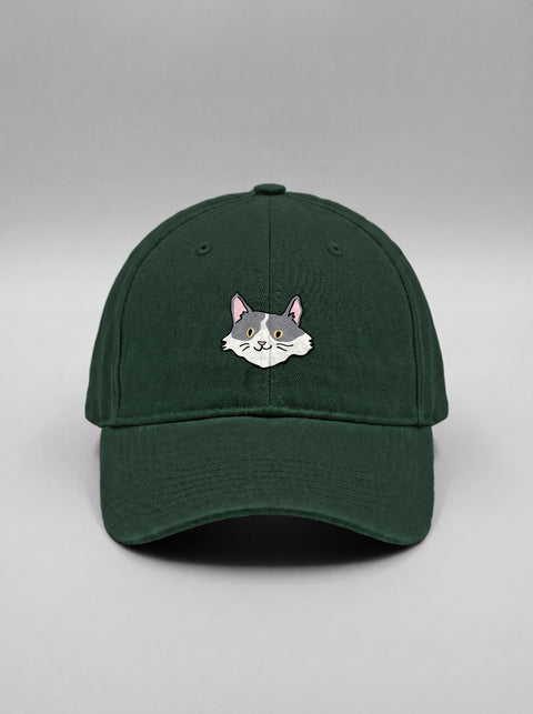 Bottle green baseball cap with embroidered white and grey cat face, front view