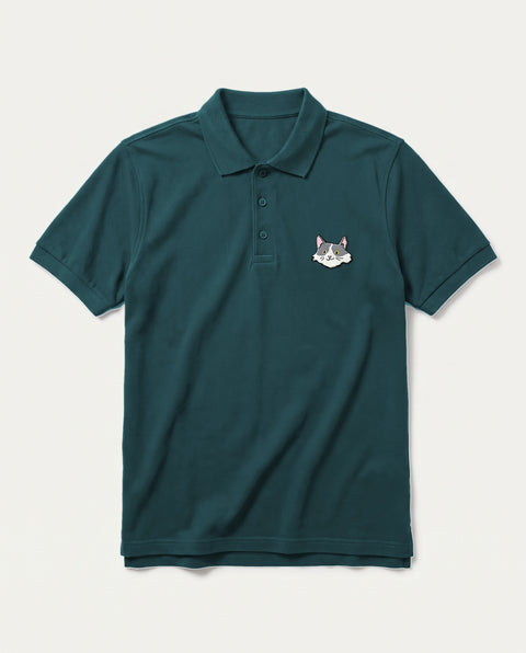 Petrol Blue polo shirt with embroidered white and grey cat face on the chest, front flat lay