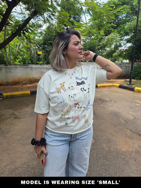 Model wearing the Lotta Dogs offwhite boxy tee in size small