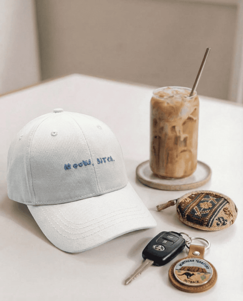 Meow Bitch white cap – lifestyle shot – Hoomans India