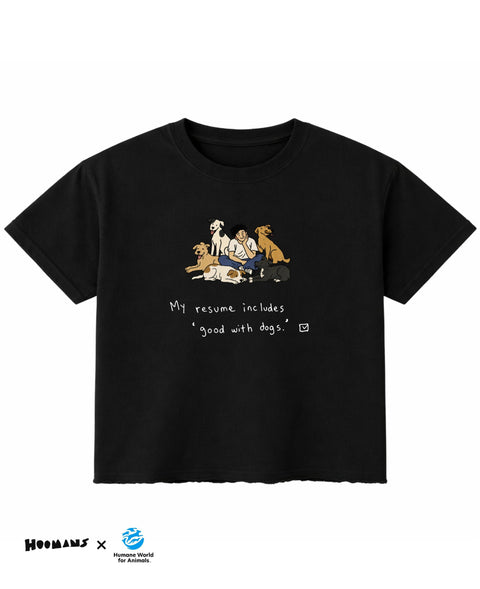 My Resume Speaks boxy fit tee in black, illustration of a hooman sitting among five indie dogs with the line good with dogs, box ticked
