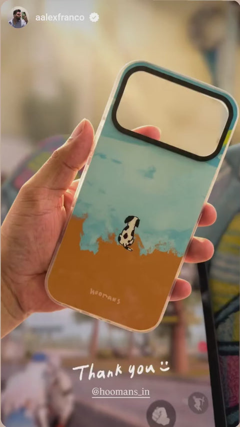 Real customer showing the Doggo Racing clear iPhone case after unboxing, Hoomans India