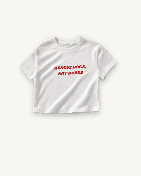 Rescue Dogs Not Dudes Baby Tee — flat product shot on off-white background