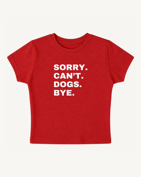 Red baby tee with 'Sorry. Can't. Dogs. Bye.' stacked white text print, front flat lay, Hoomans India